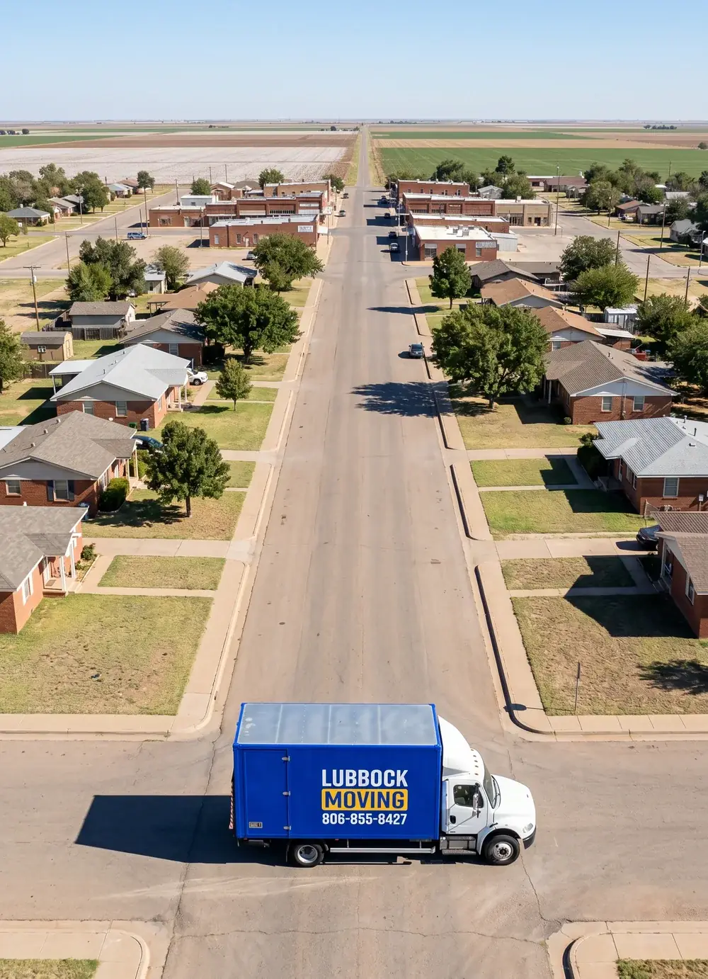 Lubbock Moving Company blue moving truck on a residential street in Hale Center, Texas