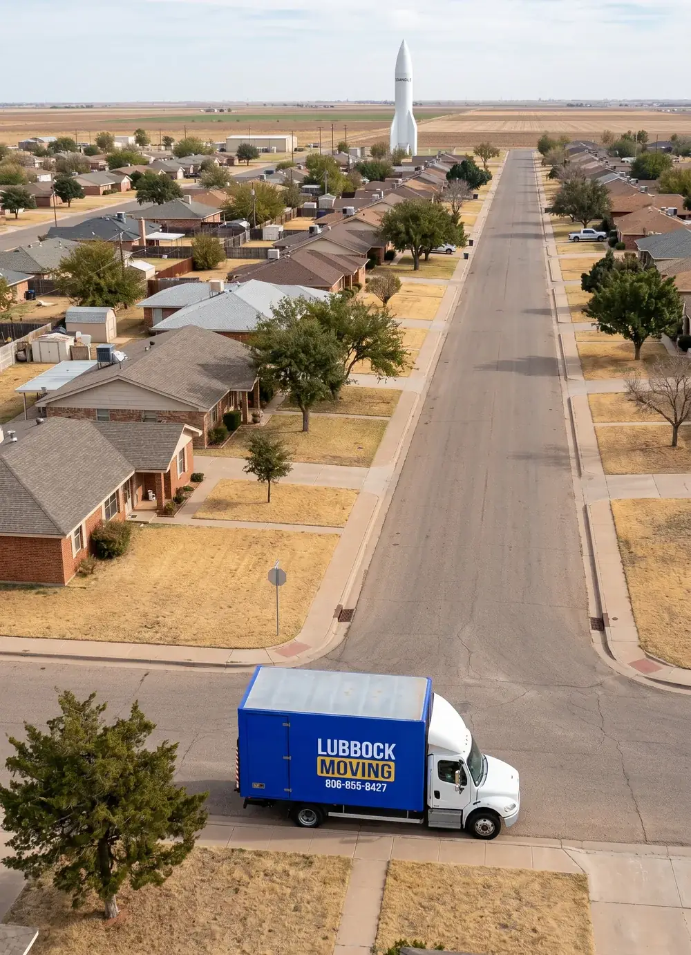 Lubbock Moving Company blue moving truck on a residential street in Seminole, Texas