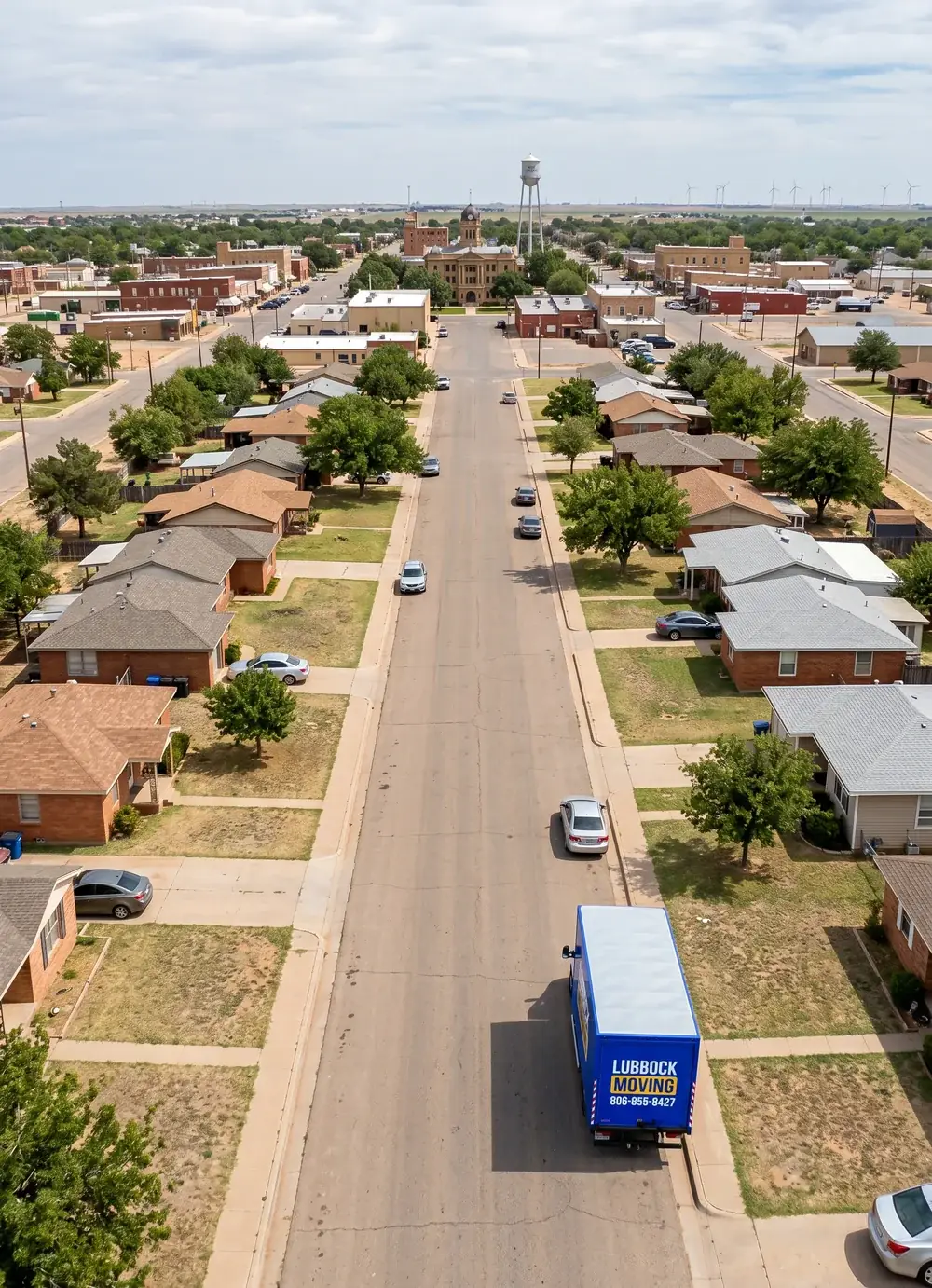 Lubbock Moving Company blue moving truck on a residential street in Snyder, Texas